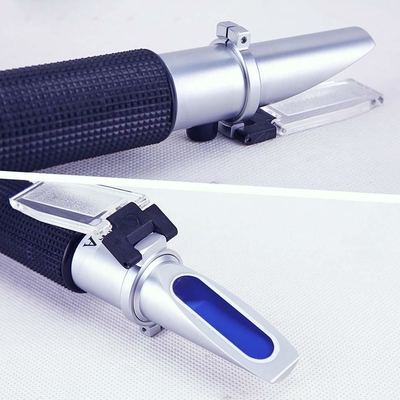 Gepersonaliseerde handbediende refractometer Brix 0-32% voor het meten van suiker in sap en fruit